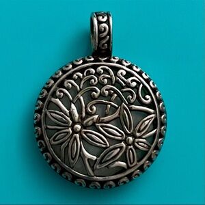 Elegant Silver Floral Pendant